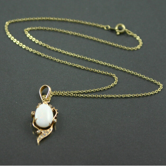cabochon opal and diamond pendant necklace in 18ct gold