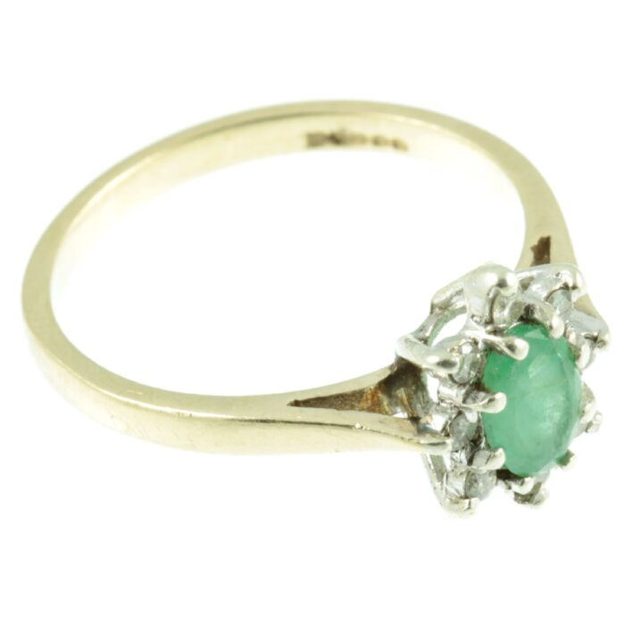 Emerald and diamond ring - side view