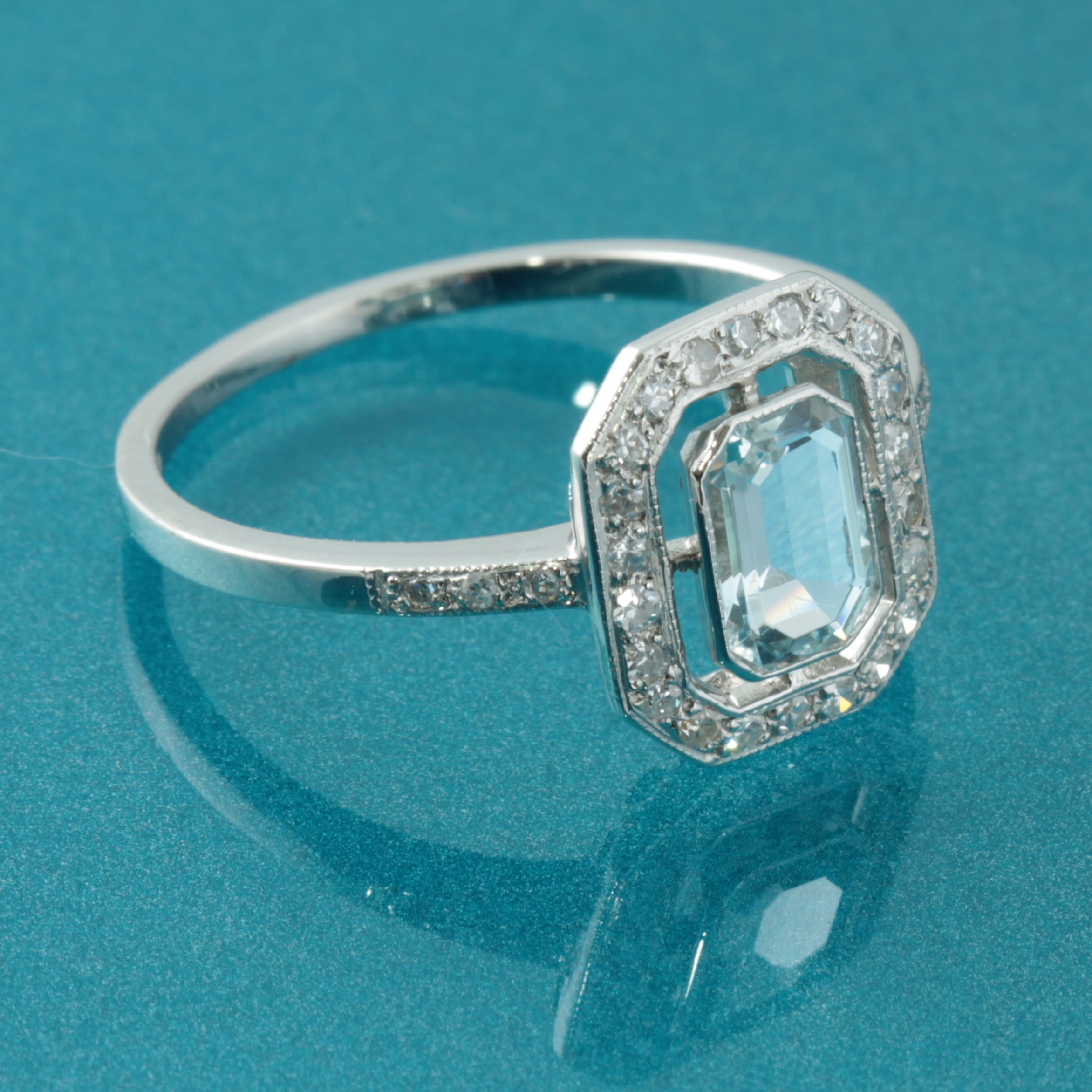 Aquamarine and Diamond halo ring